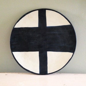 Ceramic plate, nearly black deep blue and white organic design. Irregular organic cross.