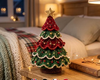May include: A crocheted Christmas tree decoration featuring alternating layers of dark green and deep red yarn. The tree is topped with a gold star and decorated with small red and gold beads, finished with a scalloped white yarn trim along each tier.