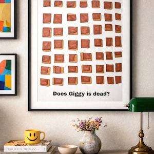 Könnte beinhalten: Gerahmter Kunstdruck mit einem Raster aus braunen und beigen Quadraten auf weißem Hintergrund. Der Text "Does Giggy is dead?" ist unten in Schwarz gedruckt. Das Kunstwerk wird an einer Wand mit anderen gerahmten Kunstwerken und Dekorationsgegenständen ausgestellt.