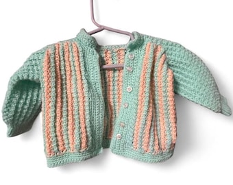 Handmade crochet 6 months baby cardigan in pastel mint green and salmon pink
