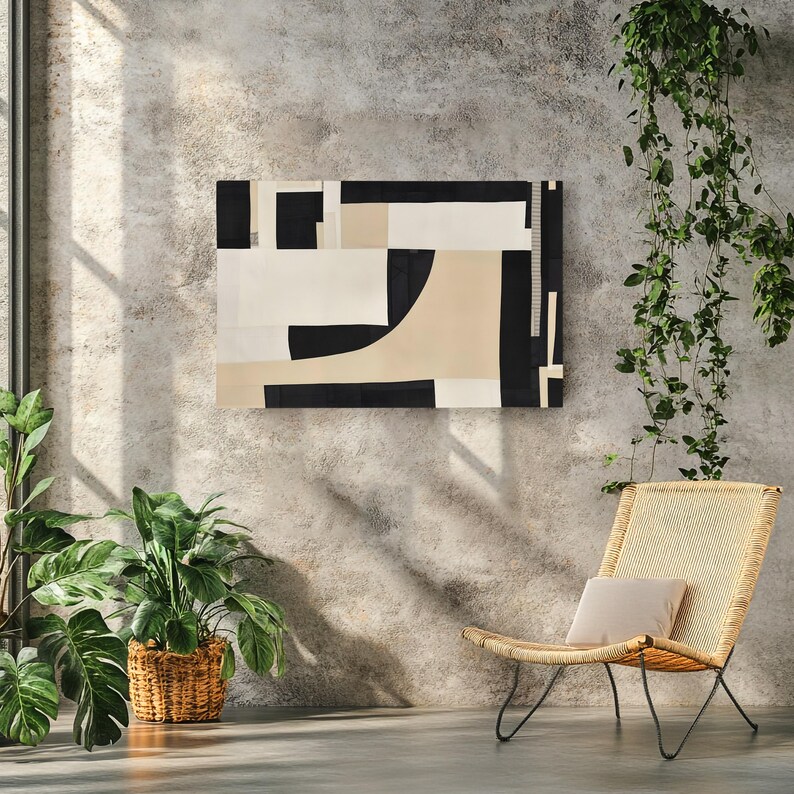 May include: A rectangular wall art piece featuring an abstract composition of bold black, white, and beige geometric shapes. The design consists of solid blocks and curved lines arranged in a balanced, non-representational layout on a flat surface.