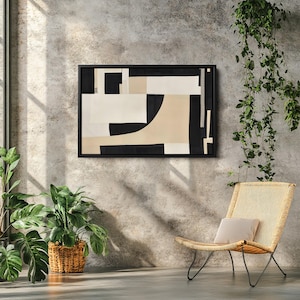 May include: A rectangular wall art piece featuring an abstract composition of black, cream, and beige geometric shapes enclosed in a thin black frame. The design consists of solid blocks and curved lines arranged in a balanced, non-representational layout.