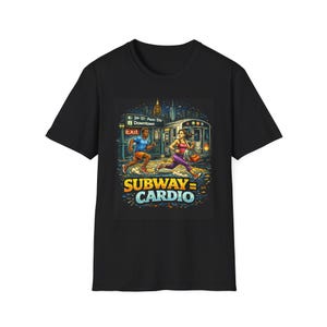 May include: Black t-shirt with a vibrant graphic depicting two people running near a subway train. The design includes the text "SUBWAY = CARDIO" in yellow and blue, set against a cityscape.