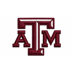 May include: Maroon and white embroidered patch featuring the letters "ATM". The letters are in a bold, block style with a white outline. The patch is likely for apparel or accessories, representing a university or organization.