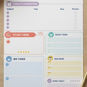 May include: A white paper homework planner titled HOMEWORK COMMAND CENTER with sections for Today's Homework, Start Here, Quick Tasks, Big Tasks, Due Soon, and Done Today. The layout features colorful icons, text labels, and a stack of books illustration.