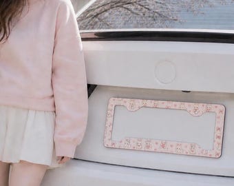 Cornice portatarga con coniglietto carino, decorazione per auto con coniglietto rosa kawaii, accessori per auto coquette femminile