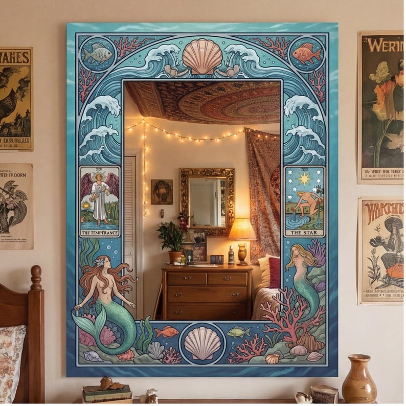 May include: A large rectangular mirror with a decorative border featuring mermaids, seashells, and ocean waves. The mirror's design incorporates tarot card imagery, including "The Temperance" and "The Star" cards, with a color palette of blues, greens, and pinks.