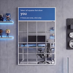 May include: A white framed grid with the text "Select all squares that show you" and "If there are none, click skip". The grid contains a desk, chair, and computer monitors. Superhero figurines are on shelves with blue LED lighting.