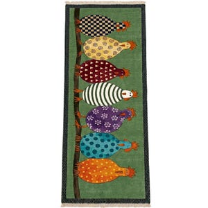 May include: A rectangular green rug featuring a repeating pattern of stylized chickens in various colours and patterns. The chickens are arranged vertically along a brown branch. The rug has a black border and fringe.