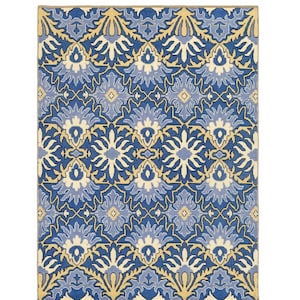 ブルーのウシャク産手織りウールラグ | ネイビー＆クリーム色の花柄カーペット | カスタムサイズ