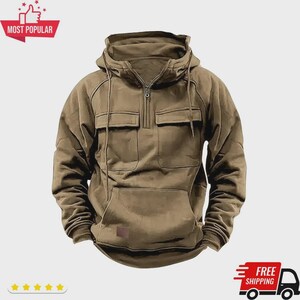 May include: A brown hooded sweatshirt with a half-zip closure, two front pockets, and a kangaroo pocket. The sweatshirt has a small brown patch near the bottom and a drawstring hood. The words "MOST POPULAR" are in a red banner.