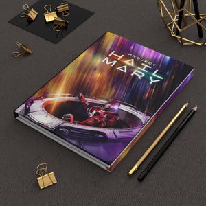 Cuaderno de tapa dura del proyecto Ave María / Diario de cine