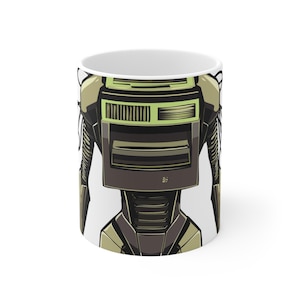 May include: White ceramic coffee mug featuring a stylized robot design. The robot has a brown and olive green color scheme with a detailed front panel and a retro aesthetic. The mug is suitable for hot or cold beverages.