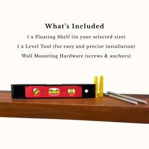 May include: A wooden floating shelf with a black and red level tool, yellow wall anchors, and silver screws. The text "What's Included" and product details are displayed above the shelf.