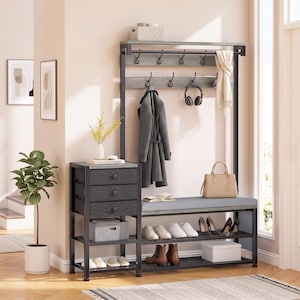 May include: A hall tree with a black metal frame, featuring a bench with a gray cushion, three mesh drawers, two tiers of shoe storage, and a coat rack with multiple hooks. The unit includes a top shelf and a gray wood-look back panel.