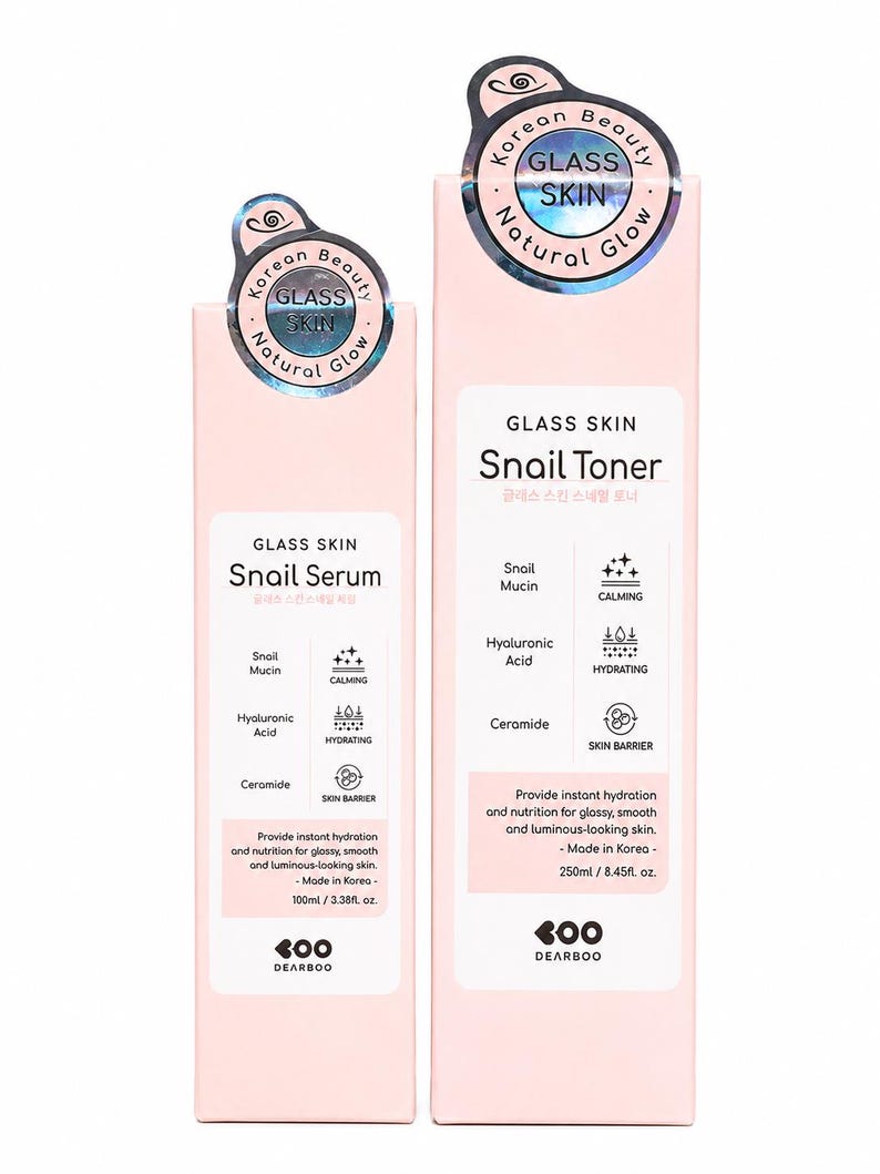 May include: Two light pink rectangular boxes of Dearboo Glass Skin Snail Serum and Snail Toner. The serum box is 100ml/3.38fl. oz. and the toner box is 250ml/8.45fl. oz. Both feature holographic circular labels with the text Glass Skin Natural Glow.