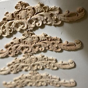 Four wood appliques 12 in x 1 ln decorative carved wood onlays for furniture appliques for doors natural wood ready for painting