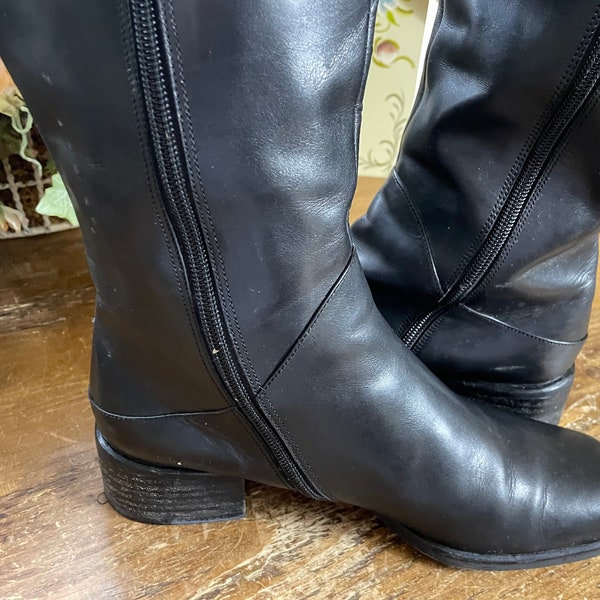 Van Eli ladies boots sz 8M blacl boots 17" from heel to top & zips up all the way3" stretch at top 14" around beautiful black leather