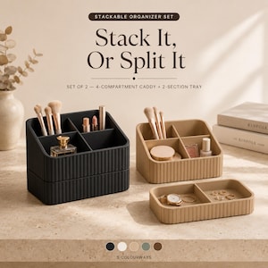 May include: A stackable organizer set consisting of a black four-compartment caddy and a tan four-compartment caddy with a matching two-section tray. The text reads: STACKABLE ORGANIZER SET, Stack It, Or Split It, SET OF 2, 4-COMPARTMENT CADDY + 2-SECTION TRAY.