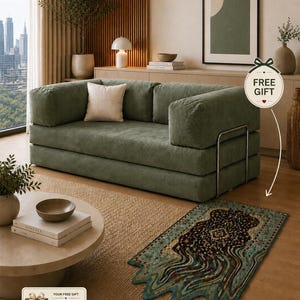Puede incluir: Un sal&oacute;n moderno con un sof&aacute; de pana verde, una alfombra beige y una alfombra estampada con un dise&ntilde;o ondulado &uacute;nico. La habitaci&oacute;n incluye una mesa de centro redonda, una obra de arte enmarcada y un regalo de una alfombra de 60 x 90 cm.