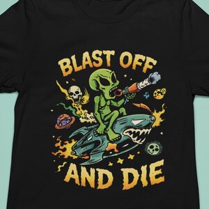 Alien Riding Rocket T-Shirt | 'Blast Off and Die' Retro Sci-Fi Graphic