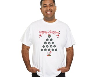 May include: A white t-shirt featuring a graphic of a Christmas tree made from dark gray bowling balls, topped with a red bow. The text Merry Christmas is printed in red above the tree, with three bowling pins at the base.