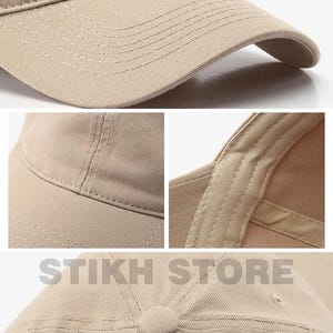 May include: Close-up shots of a beige baseball cap. The cap features a curved brim, stitched details, and a button on top. The text "STIKH STORE" is visible in the image. This hat is a casual accessory.
