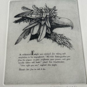May include: Etching of an eagle with a feathered headdress and a long beak. The artwork includes text that reads, "A celebrated Eagle was rebuked..." and "Moral: It's fun to rub it in." Signed by J. Washburn, numbered 62/120, and dated 1982.