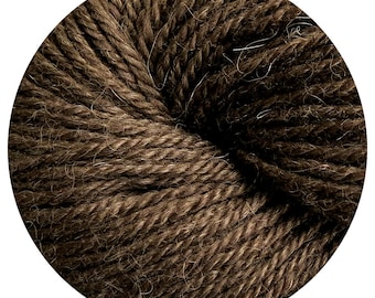 May include: A skein of brown wool yarn.