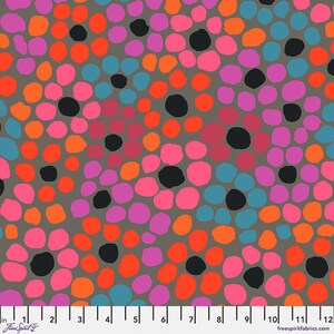 May include: A gray fabric with a repeating pattern of colorful circles and dots. The circles are in shades of pink, orange, blue, and purple. The fabric is perfect for quilting, sewing, and crafting.