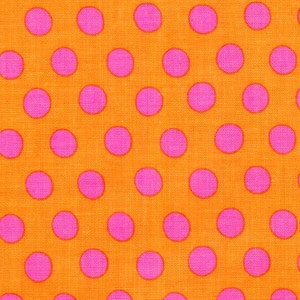 May include: Orange fabric with a repeating pattern of pink polka dots.