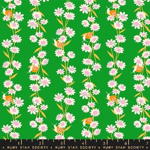 May include: A green fabric with a repeating pattern of white flowers and orange snails. The fabric is designed by Ruby Star Society.