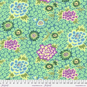 May include: A teal blue fabric with a floral pattern. The flowers are in shades of pink, yellow, and green. The fabric has a small, white polka dot pattern.