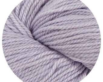 May include: A skein of soft, light purple yarn. The yarn is made of wool and is perfect for knitting or crocheting.