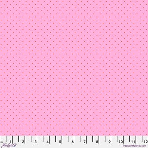 May include: A pink fabric with a repeating pattern of small, evenly spaced red dots.