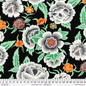 May include: Black fabric with a repeating pattern of white, gray, and orange flowers. The flowers are stylized and have a layered, dimensional look. The background is black.
