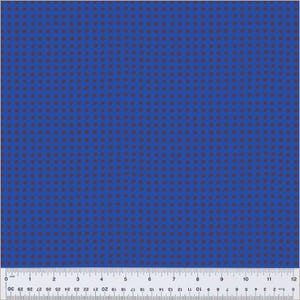 May include: A blue fabric with a repeating pattern of small, dark brown circles.