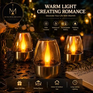 May include: Three solar-powered lanterns with gold-toned metallic bases and clear glass shades, each containing an internal LED light that mimics a flickering flame. The text WARM LIGHT CREATING ROMANCE and MINIMALBEAMS is visible.