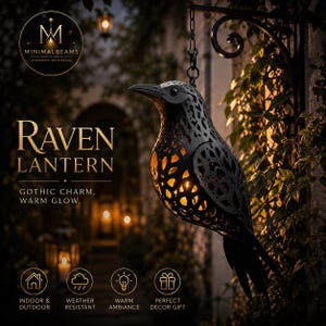 May include: A black metal raven-shaped lantern with intricate cut-out patterns, hanging from a curved wall bracket. The lantern emits a warm yellow light from within. Text on the image reads MINIMALBEAMS RAVEN LANTERN GOTHIC CHARM, WARM GLOW.