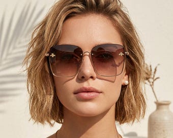 Lyxiga designersolglasögon för kvinnor UV400 guldbågar modeglasögon