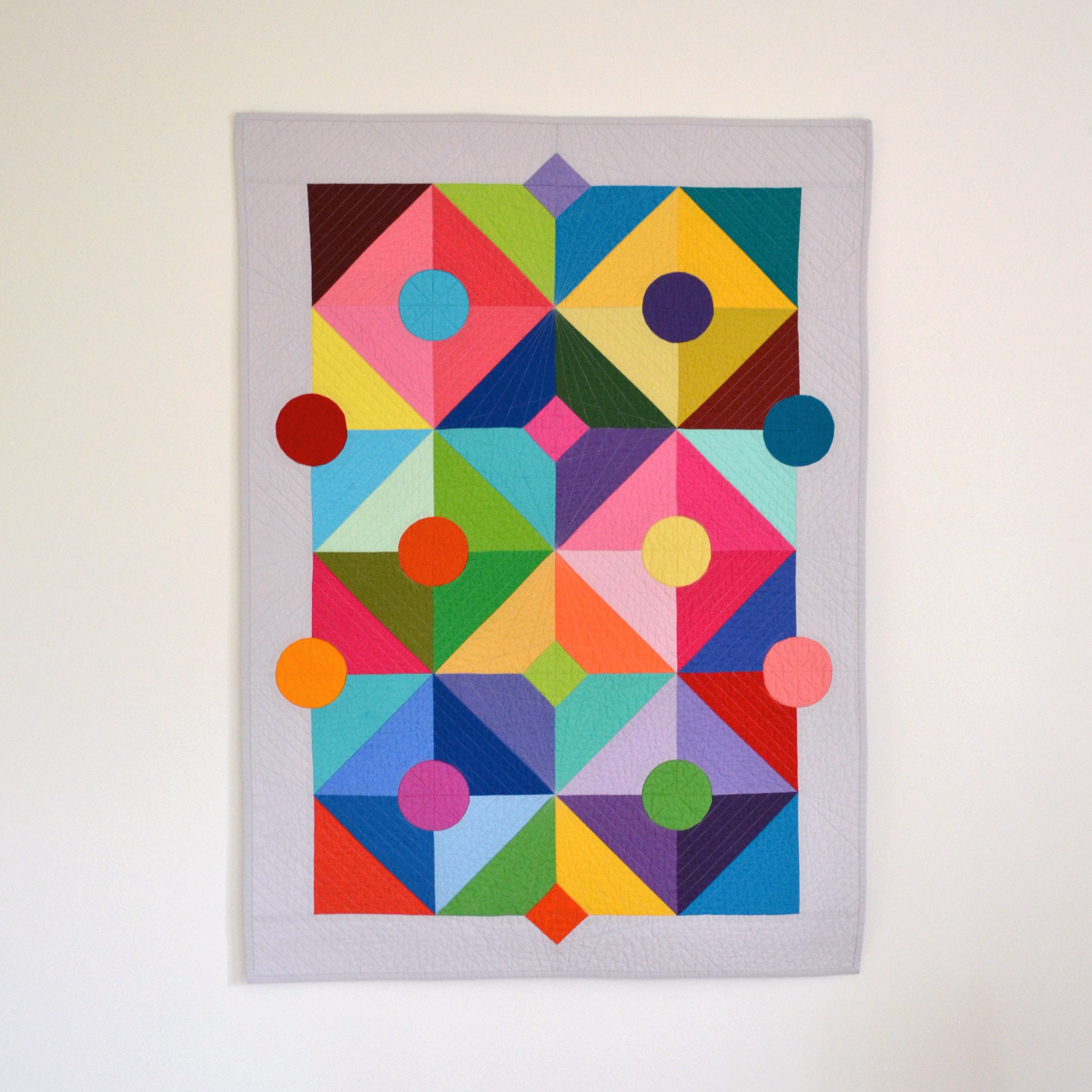 Geometric baby quilt deals