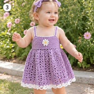May include: A lilac crochet dress with a white daisy applique and white trim. The dress has a matching headband. The dress is a handmade item, perfect for a baby or toddler.