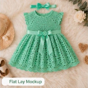 May include: A mint green sleeveless crochet dress featuring a round neckline, ruffled cap sleeves, and a matching satin ribbon waistband with a central bow. A coordinating mint green satin headband with a bow is positioned above the dress.