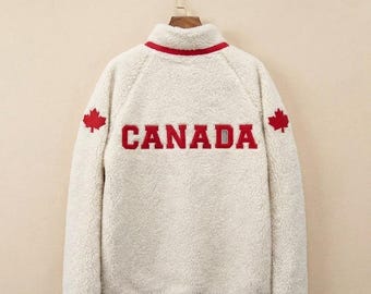 Chaqueta de forro polar Sherpa de Canadá – Cómoda chaqueta de invierno con cremallera y estampado de hoja de arce
