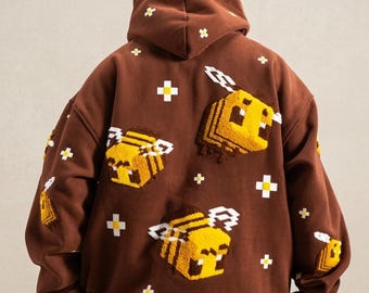Sudadera con capucha estampada en 3D con diseño de abeja pixelada marrón – Sudadera de forro polar estilo streetwear de corte amplio