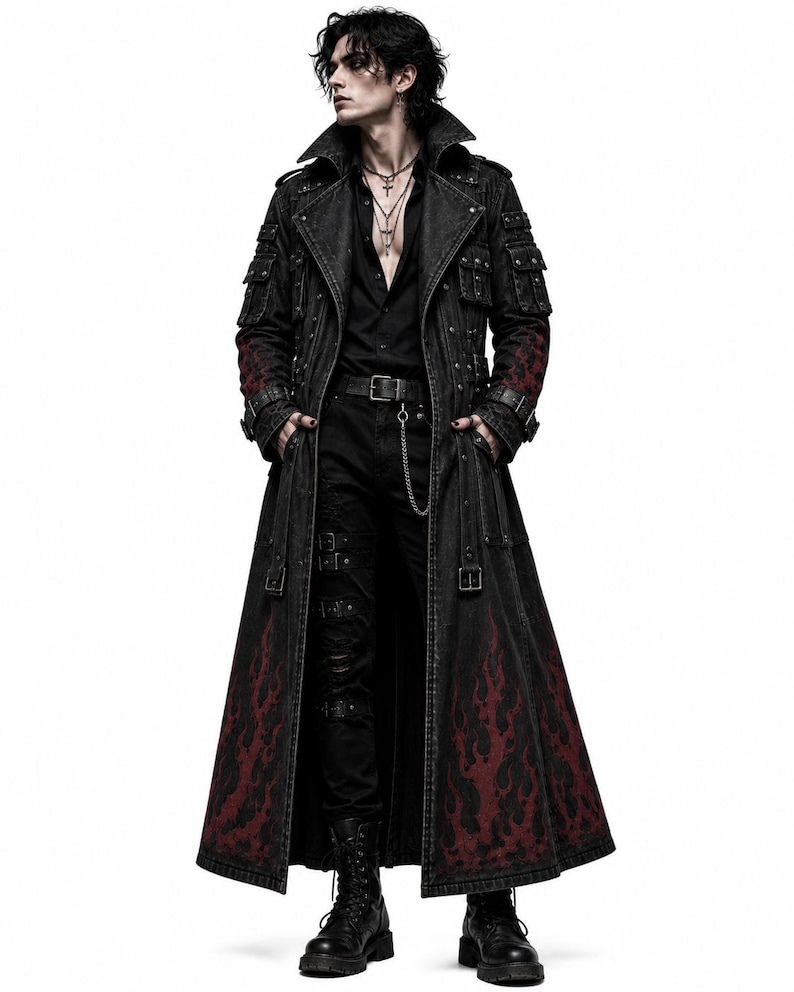 May include: A long black denim trench coat featuring a dark red flame pattern along the lower hem and sleeves, multiple utility pockets on the chest and shoulders, silver-toned metal buckles, straps, and a structured collar over a black shirt.