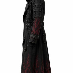 Close up side profile of a post apocalyptic military coat for men, highlighting heavy duty utility straps, buckles, and weathered darkwear aesthetic.