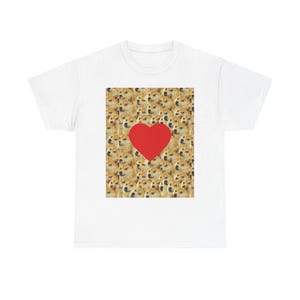 May include: White t-shirt featuring a repeating pattern of Doge meme faces with a large red heart in the center. The shirt is a casual, unisex style, perfect for meme lovers and those who enjoy internet culture.