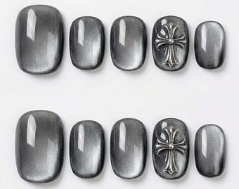 Uñas postizas con cruz gótica plateada, ojo de gato magnético gris, arte de uñas ciberpunk