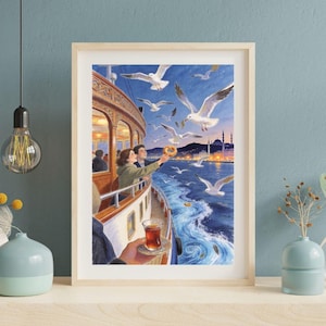 May include: A framed print depicts a boat scene with people feeding seagulls. The artwork features a couple on the boat's deck, with a city skyline in the background. A hand holds a glass of tea. The color palette includes blues, whites, and browns.